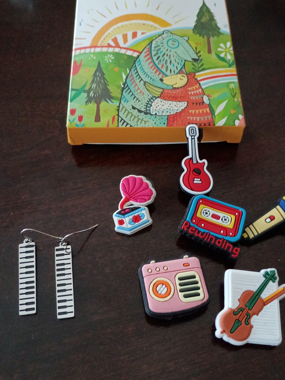 silver-tone piano keyboard dangle earrings & Croc Charms